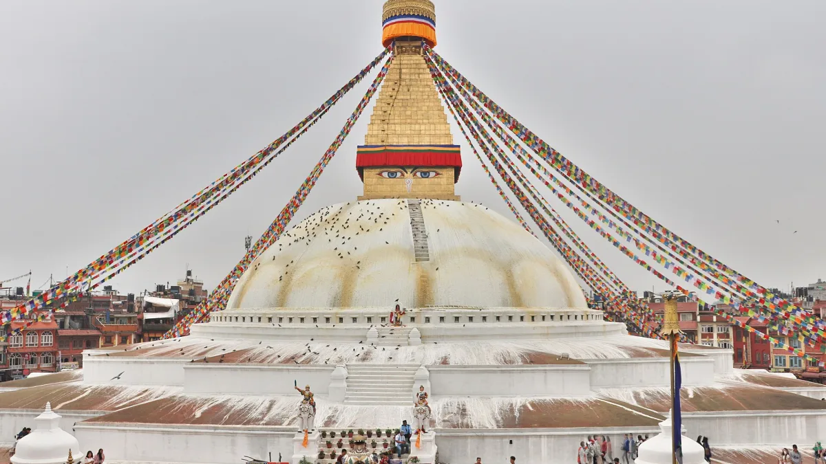The white dome and painted eyes of Boudhanath Stupa in Kathmandu