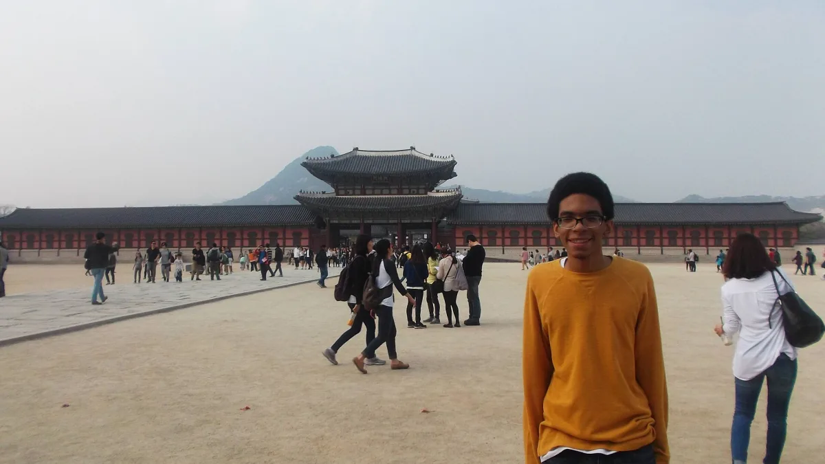 The gate of Gyeongbokgung Palace in Seoul, with its painted eaves and stone forecourt